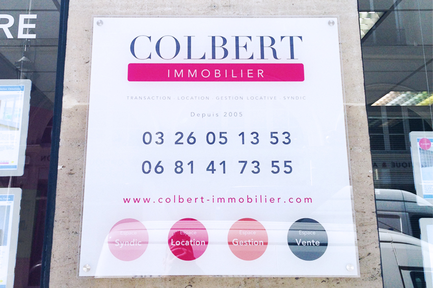 plaque signalétique plexiglass plexi pro prefessionnel colbert immobilier immo communication reims publicité