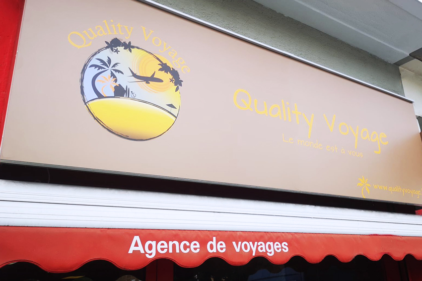 réalisation et pose d'enseignes et d'adhésifs pour Quality Voyage Charleville-Mézières