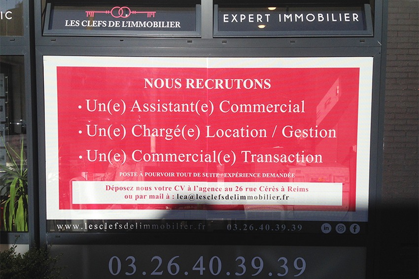 les clefs de l'immobilier marquage vitrine adhésif microperforé agence reims